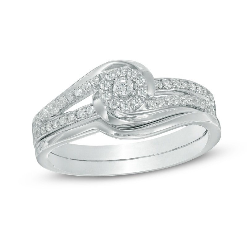 Main Image 1 of 1/4 CT. T.W. Diamond Swirl Frame Bridal Set in 10K White Gold
