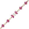 Thumbnail Image 0 of Lab-Created Ruby and White Sapphire Flower Bracelet in Sterling Silver and 18K Gold Plate - 7.25"