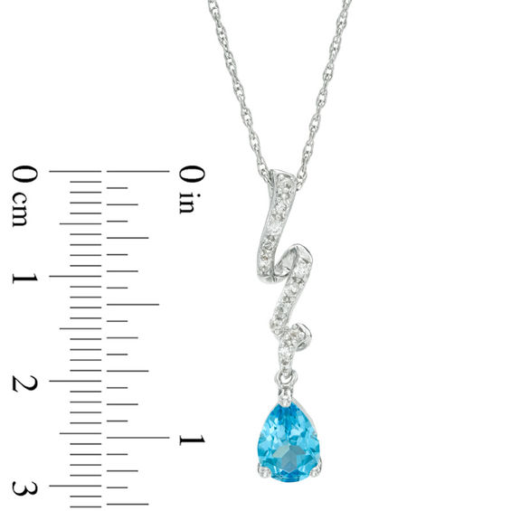Pear-Shaped Blue Topaz and Lab-Created White Sapphire Ribbon Pendant and Earrings Set in Sterling Silver