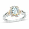 Thumbnail Image 1 of Oval Aquamarine and 1/5 CT. T.W. Diamond Frame Ring in 10K White Gold with Yellow Rhodium