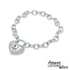 Thumbnail Image 0 of Forever Locking Love™ 1/10 CT. T.W. Diamond Heart-Shaped Lock Charm Bracelet in Sterling Silver - 7.5"