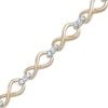 Thumbnail Image 0 of 1/2 CT. T.W. Diamond Infinity Loop Bracelet in 10K Gold - 7.25"