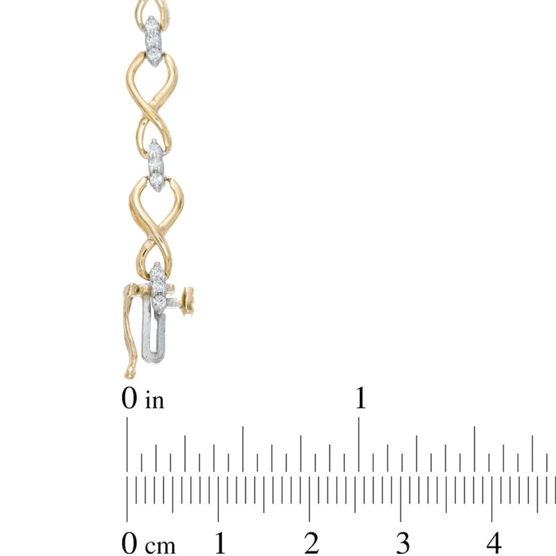 1/2 CT. T.W. Diamond Infinity Loop Bracelet in 10K Gold - 7.25"