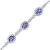 Thumbnail Image 1 of Oval Tanzanite and Lab-Created White Sapphire Frame Three Stone Bracelet in Sterling Silver