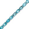 Thumbnail Image 1 of Oval Blue Topaz Tennis Bracelet in Sterling Silver