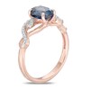 Thumbnail Image 1 of Oval London Blue Topaz and Lab-Created White Sapphire Twist Ring in 10K Rose Gold