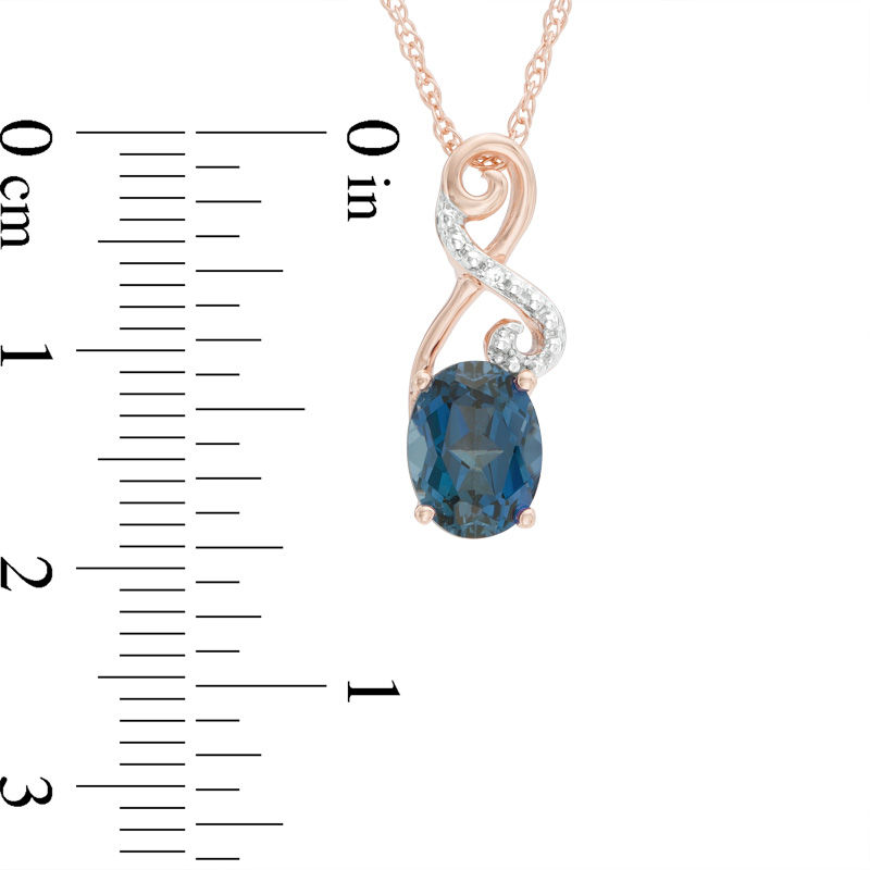 Oval London Blue Topaz and Lab-Created White Sapphire Infinity Loop Pendant in 10K Rose Gold