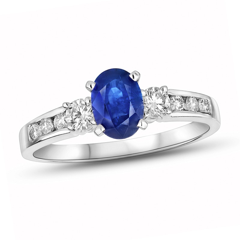 Oval Blue Sapphire and 3/8 CT. T.W. Diamond Three Stone Ring in 14K White Gold