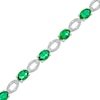 Thumbnail Image 0 of Oval Lab-Created Emerald and Diamond Accent Bracelet in Sterling Silver - 7.5"