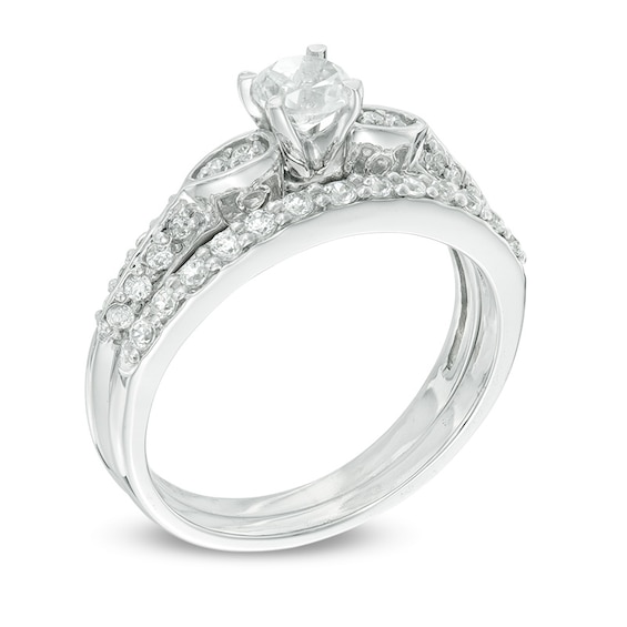 4.0mm Lab-Created White Sapphire and 1/5 CT. T.w. Diamond Bridal Set in 10K White Gold