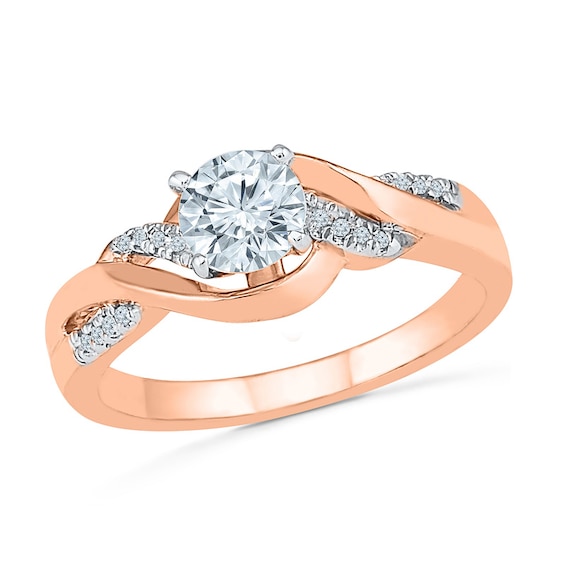 Lab-Created White Sapphire and 1/10 CT. T.w. Diamond Twist Bridal Set in 10K Rose Gold