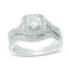 Thumbnail Image 0 of 5.0mm Lab-Created White Sapphire and Diamond Accent Frame Twist Bridal Set in Sterling Silver
