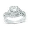 Thumbnail Image 1 of 5.0mm Lab-Created White Sapphire and Diamond Accent Frame Twist Bridal Set in Sterling Silver