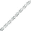 Thumbnail Image 1 of Diamond Accent "XO" Link Bracelet in Sterling Silver - 7.25"