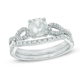 6.0mm Lab-Created White Sapphire and 1/6 CT. T.W. Diamond Twist Bridal Set in 10K White Gold