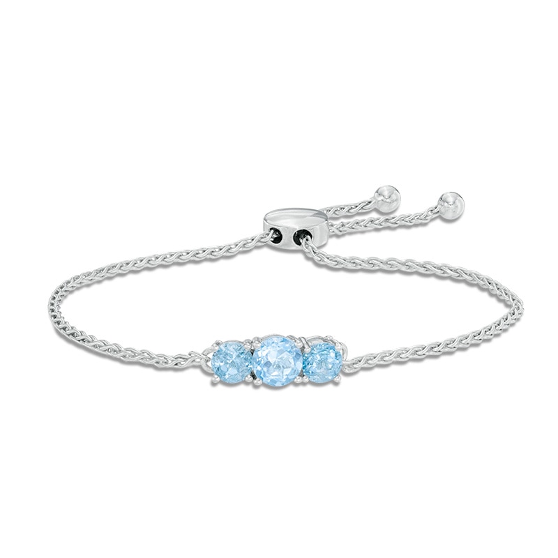 Main Image 1 of 6.0mm Swiss Blue Topaz Three Stone Bolo Bracelet in Sterling Silver - 8.5"