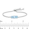 Thumbnail Image 1 of 6.0mm Swiss Blue Topaz Three Stone Bolo Bracelet in Sterling Silver - 8.5"