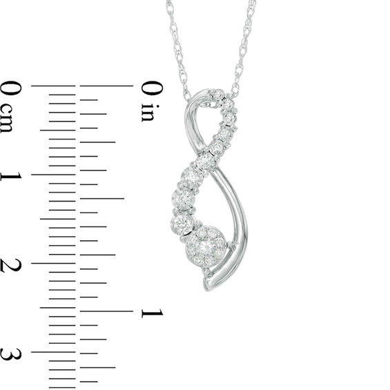 1/4 CT. T.w. Diamond Infinity Pendant in 10K White Gold