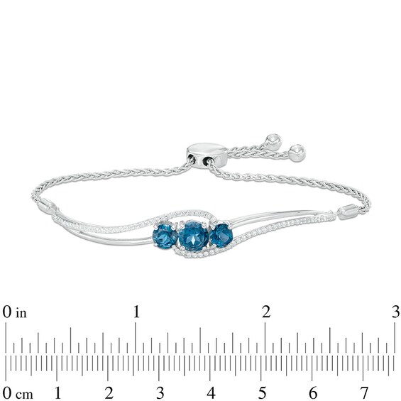 6.0mm London Blue Topaz and Lab-Created White Sapphire Three Stone Bypass Bolo Bracelet in Sterling Silver - 8.0"