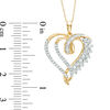 Thumbnail Image 2 of 1/2 CT. T.W. Baguette and Round Diamond Double Heart Swirl Pendant in 10K Gold