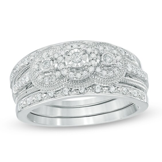 1/4 CT. T.W. Diamond Frame Three Stone Vintage-Style Three-Piece Bridal Set in 10K White Gold 1/4 CT. T.W. Diamond Frame Three Stone Vintage-Style Three-Piece Bridal Set in 10K White Gold