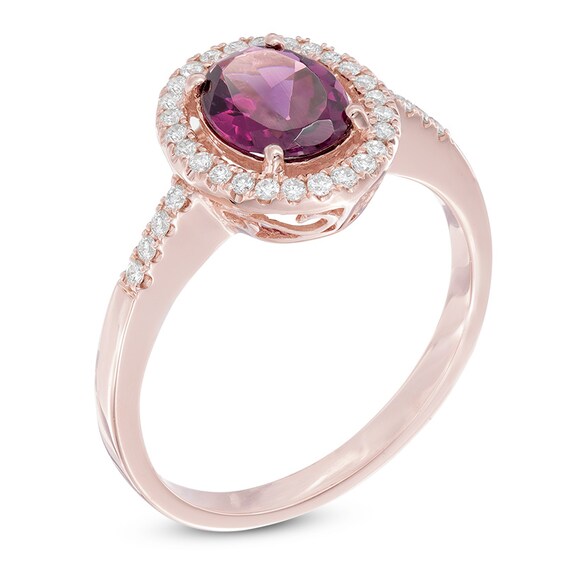Oval Rhodolite Garnet and 1/6 CT. T.w. Diamond Frame Ring in 10K Rose Gold