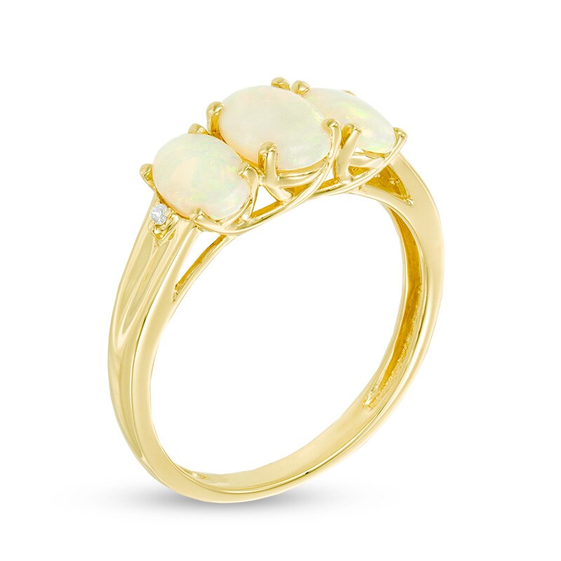 Main Image 2 of Oval Opal and Diamond Accent Three Stone Ring in 10K Gold