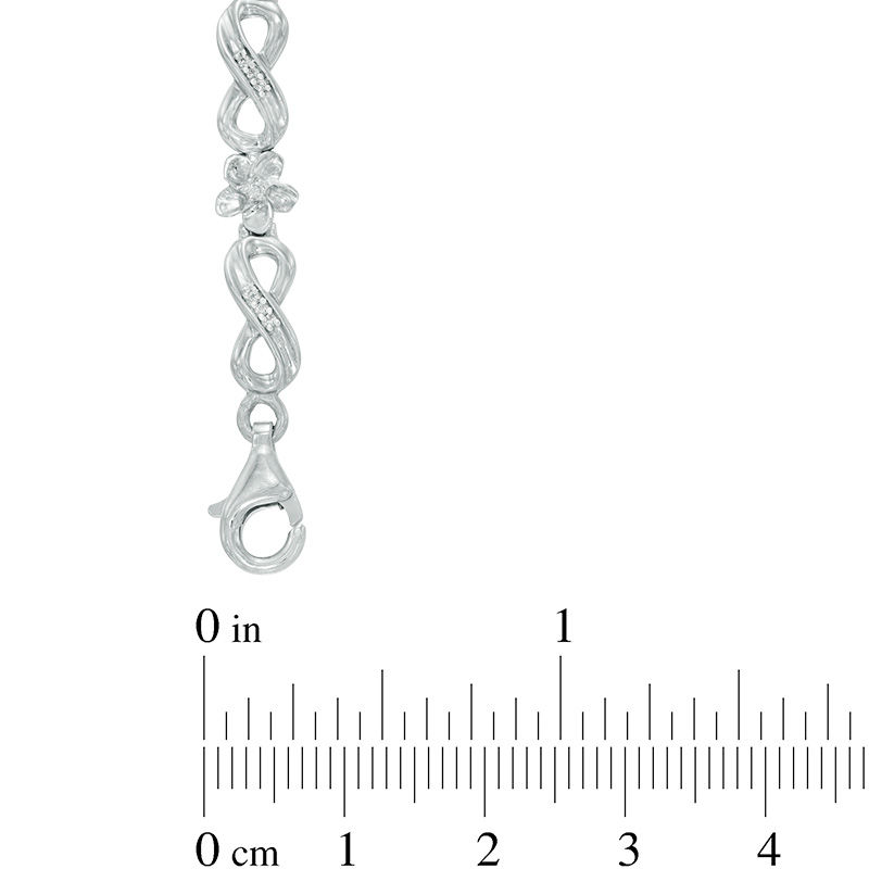 1/4 CT. T.W. Diamond Infinity Link Flower Bracelet in Sterling