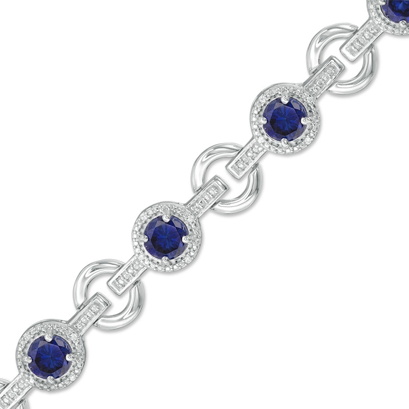 5.0mm Lab-Created Blue Sapphire and 1/10 CT. T.W. Diamond Circle Link Bracelet in Sterling Silver - 7.25"
