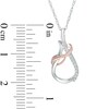 Thumbnail Image 1 of Diamond Accent Teardrop with Swirling Ribbon Pendant in 10K Two-Tone Gold
