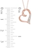 Thumbnail Image 1 of Diamond Accent Four Stone Tilted Heart Pendant in 10K Rose Gold