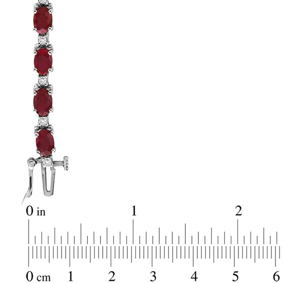 Oval Ruby and 3/8 CT. T.w. Diamond Bracelet in 14K White Gold