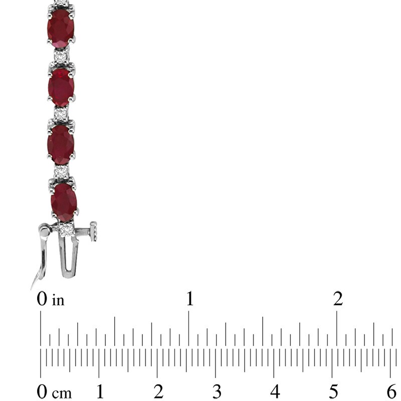 Oval Ruby and 3/8 CT. T.W. Diamond Bracelet in 14K White Gold