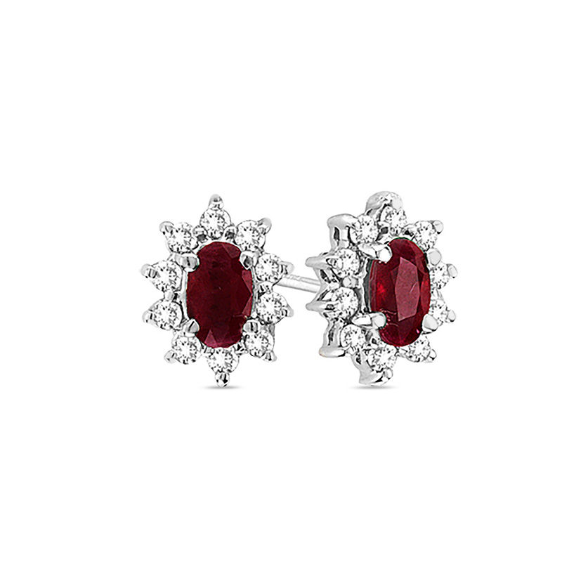 Oval Ruby and 1/3 CT. T.W. Diamond Sunburst Frame Stud Earrings in 14K White Gold