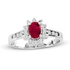 Thumbnail Image 0 of Oval Ruby and 1/4 CT. T.W. Diamond Sunburst Frame Ring in 14K White Gold