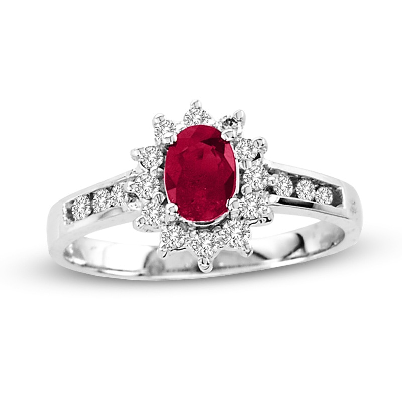 Oval Ruby and 1/4 CT. T.W. Diamond Sunburst Frame Ring in 14K White Gold