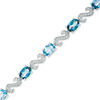 Thumbnail Image 1 of Oval London and Swiss Blue Topaz with Diamond Accent "S" Bracelet in Sterling Silver - 7.25"