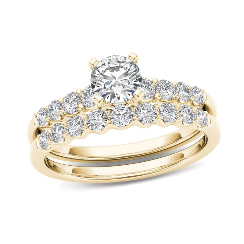 Main Image 1 of 1 CT. T.W. Diamond Scallop Shank Bridal Set in 14K Gold
