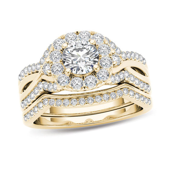 1-1/4 CT. T.w. Diamond Twist Shank Frame Bridal Set in 14K Gold