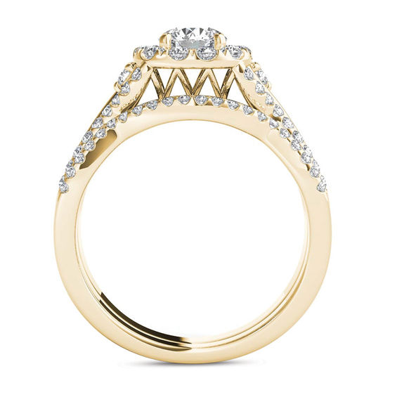 1-1/4 CT. T.w. Diamond Twist Shank Frame Bridal Set in 14K Gold