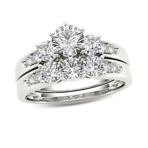 1-1/2 CT. T.w. Diamond Three Stone Bridal Set in 14K White Gold