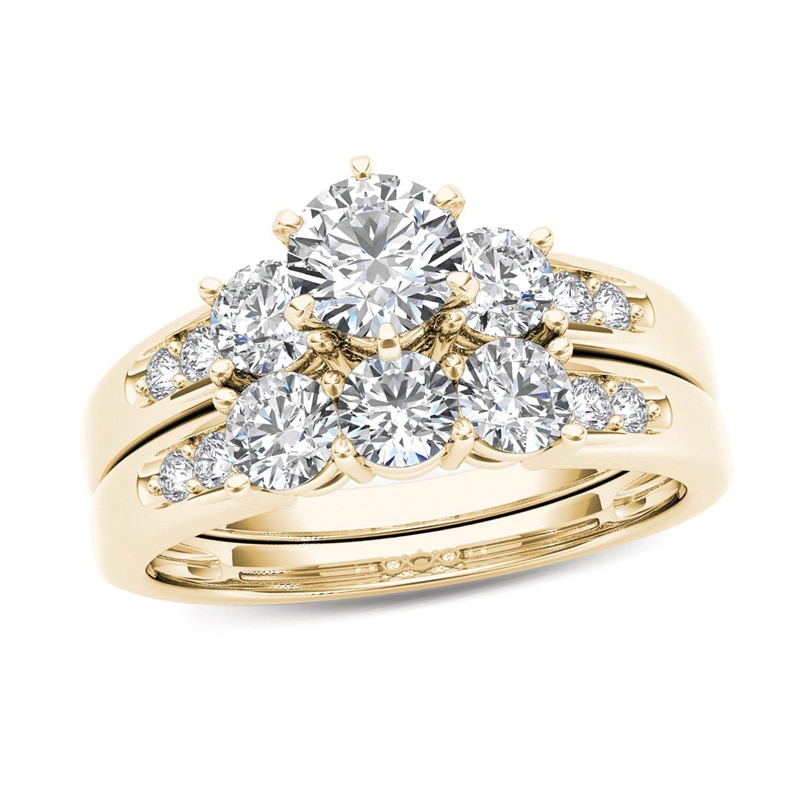 Main Image 1 of 1-1/2 CT. T.W. Diamond Three Stone Bridal Set in 14K Gold