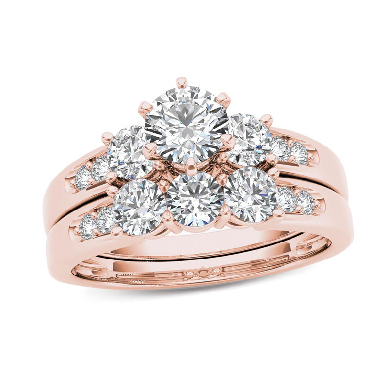 Main Image 1 of 1-1/2 CT. T.W. Diamond Three Stone Bridal Set in 14K Rose Gold