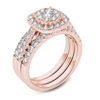 Thumbnail Image 1 of 1-1/2 CT. T.W. Multi-Diamond Frame Three Piece Bridal Set in 14K Rose Gold