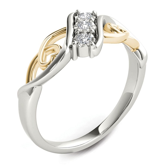 1/10 CT. T.w. Diamond Three Stone Bypass with Hearts Ring in 14K White Gold and Yellow Rhodium