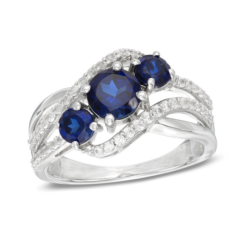 Main Image 1 of Lab-Created Blue and White Sapphire Three Stone Bypass Ring in Sterling Silver
