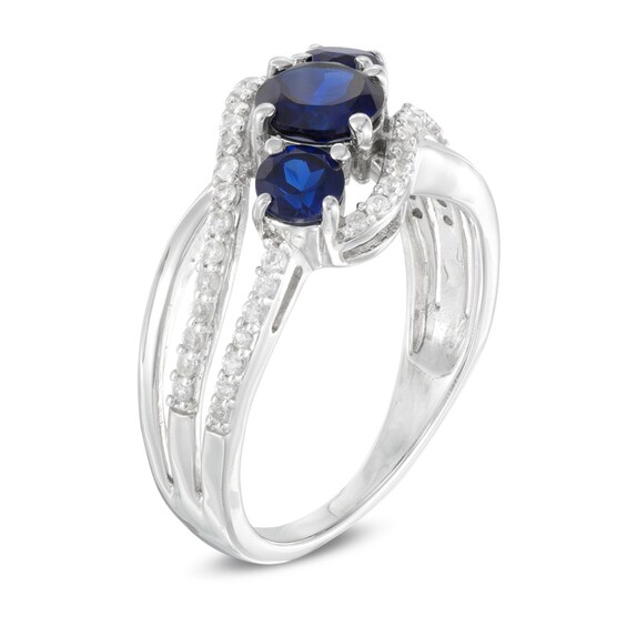 Lab-Created Blue and White Sapphire Three Stone Bypass Ring in Sterling Silver