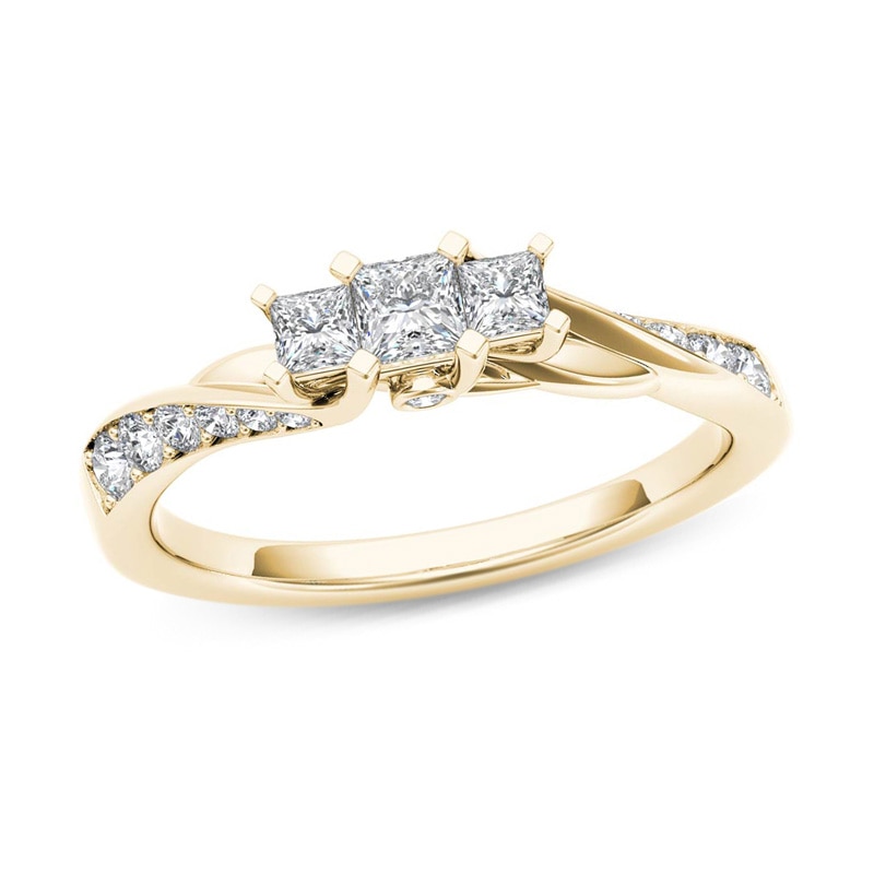 Main Image 1 of 1/2 CT. T.W. Princess-Cut Diamond Three Stone Twist Shank Ring in 14K Gold
