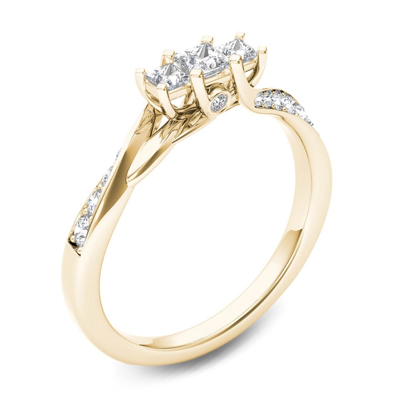 1/2 CT. T.W. Princess-Cut Diamond Three Stone Twist Shank Ring in 14K Gold