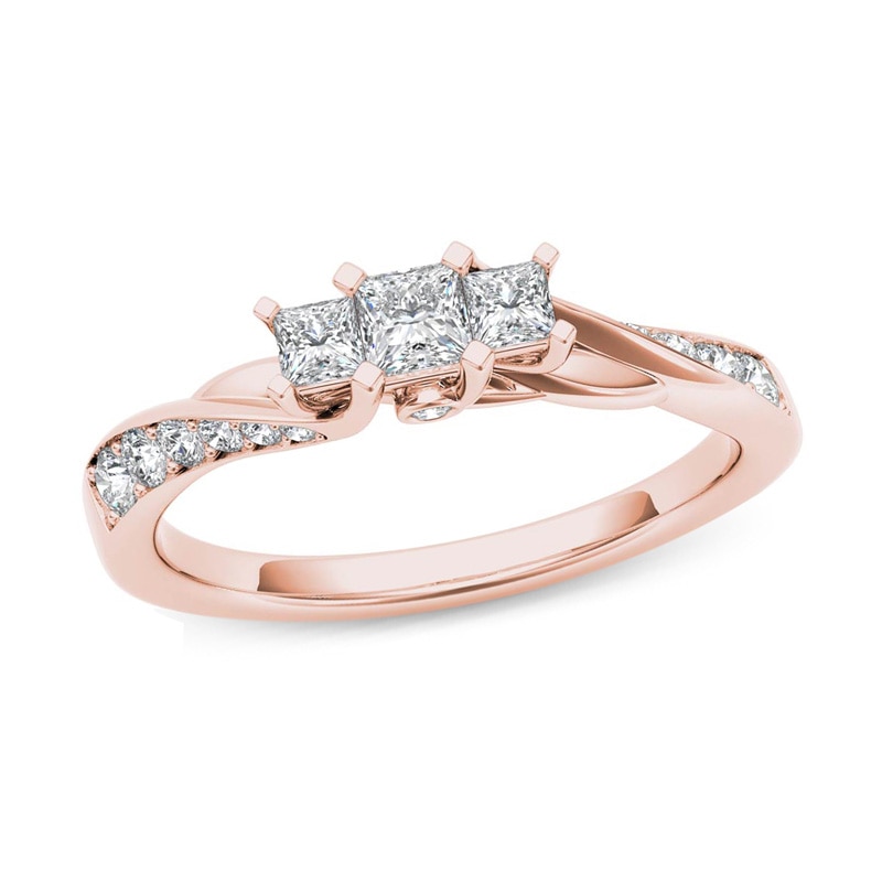 Main Image 1 of 1/2 CT. T.W. Princess-Cut Diamond Three Stone Twist Shank Ring in 14K Rose Gold